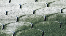 Flat Green Roof Tiles Partially Covered With Frost On A Winter Morning