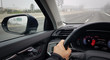 © nbnserge - Driving car on highway in fog weather, interior driver view