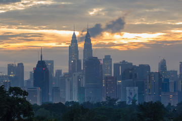 kuala lumpur city skyline during sunrise