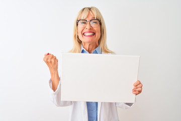 Sticker - Middle age scientist woman wearing glasses holding banner over isolated white background screaming proud and celebrating victory and success very excited, cheering emotion