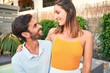 © Krakenimages.com - Young beautiful couple on vacation smiling happy and confident. Standing with smile on face hugging at the beach club