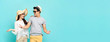 © Atstock Productions - Happy couple in summer beach casual clothes on light blue banner background