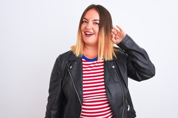 Sticker - Young beautiful woman wearing striped shirt and jacket over isolated white background smiling with hand over ear listening an hearing to rumor or gossip. Deafness concept.