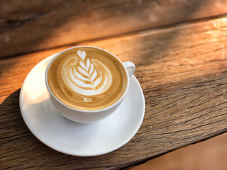 Coffee cup latte art in morning