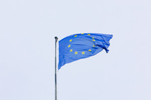 European Union Flag In Front Of Blue Sky