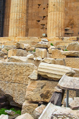 Close-up view of ancient ruins of The Parthenon. It is a former temple on the Athenian Acropolis, Greece, dedicated to the goddess Athena. Parts of the columns, stones. Acropolis, Athens, Greece