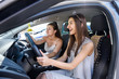 © RomanR - Girls travelling in car together, vacation concept