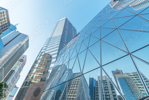 Fototapeta na szkło Zewnętrzna część nowoczesnej architektury w centrum miasta. Budynek streszczenie tło