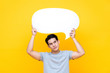 © Atstock Productions - Unhappy bored young Asian man with empty speech bubble