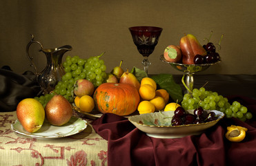 Still life with fruits, porcelain and sterling silver