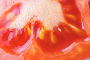 Wall Mural - The pulp of a tomato close-up, macro photo. Organic natural food concept. Fresh ripe tomato.