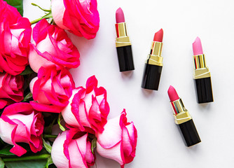 Lipsticks and red roses