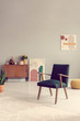 © Photographee.eu - Green retro armchair in grey living room interior with wooden furniture