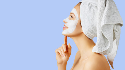 Wall Mural - cosmetology, skin care, face treatment, spa and natural beauty concept. woman with facial mask.