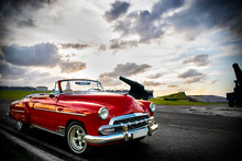 Cuban Car On The Road At Sunset