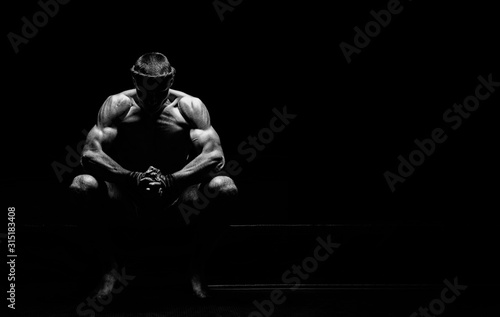 Εκτύπωση καμβά World champion in Thai boxing is sitting in the ring and getting ready for the next fight