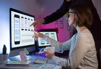 Wall Mural - the ux user interface designer is developing for mobile phone applications.