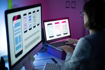 Wall Mural - designers create a user interface for mobile phones. website development. user experience.