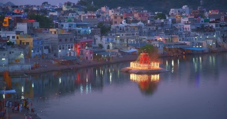 Fototapete - View of famous indian hinduism pilgrimage town sacred holy hindu religious city Pushkar with Pushkar ghats. Rajasthan, India.