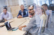 © Agnieszka Olek/Caia Image - Business people listening in conference room meeting