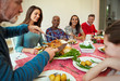 © Robert Daly/Caia Image - Family enjoying Christmas turkey dinner at table