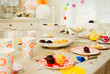 © Robert Daly/Caia Image - Cupcakes and decorations on birthday party table