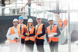© Agnieszka Olek/Caia Image - Portrait confident engineers and architects at construction site