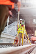 © Agnieszka Olek/Caia Image - Male engineer using theodolite on tracks at construction site
