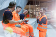 © Agnieszka Olek/Caia Image - Construction workers eating lunch at construction site