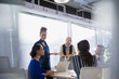 © Sam Edwards/Caia Image - Business people talking in office meeting