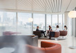 © Martin Barraud/Caia Image - Business people meeting in urban highrise office lounge