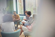 © Caiaimage/Agnieszka Olek/Caia Image - People listening to man in group therapy session