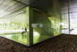 © Caiaimage/Martin Barraud/Caia Image - Business people talking in modern office lobby