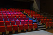 © Martin Barraud/Caia Image - Red seats in empty auditorium