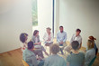 © Caiaimage/Rafal Rodzoch/Caia Image - People talking in a circle in group therapy session