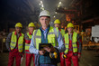 © Caiaimage/Agnieszka Olek/Caia Image - Portrait confident supervisor and steelworkers in steel mill