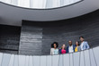 © Caiaimage/Martin Barraud/Caia Image - Portrait confident business people standing on office balcony
