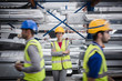 © Martin Barraud/Caia Image - Portrait confident, smiling female supervisor in steel factory