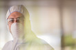 © Caiaimage/Martin Barraud/Caia Image - Portrait scientist in clean suit