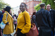 © TomMerton/Caia Image - Portrait smiling, confident businesswoman in crowd
