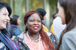 © TomMerton/Caia Image - Women talking at conference