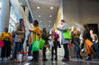 © Sam Edwards/Caia Image - Business people with bags talking at conference
