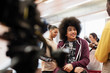 © Sam Edwards/Caia Image - Teenagers with video camera and microphone vlogging