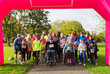 © Chris Ryan/Caia Image - Portrait crowd of runners ready at charity run starting line