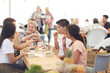 © Trevor Adeline/Caia Image - Friends eating lunch at farmer‚Äôs market