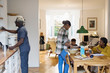 © Tom Merton/Caia Image - Grandparents and grandchildren baking in kitchen