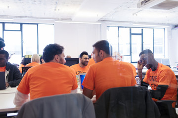 Hackers coding for charity at hackathon