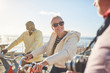 © Trevor Adeline/Caia Image - Smiling active senior tourist friends bike riding