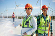 © Trevor Adeline/Caia Image - Portrait confident engineers at alternative energy power plant
