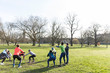 © Sam Edwards/Caia Image - People exercising in sunny park